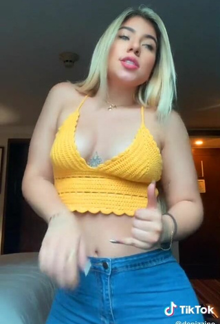 4. Sweetie Chantall Pizzino Shows Cleavage in Yellow Crop Top