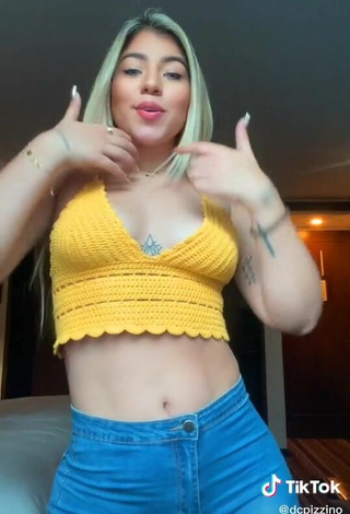 5. Sweetie Chantall Pizzino Shows Cleavage in Yellow Crop Top