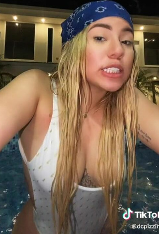 4. Sexy Chantall Pizzino Shows Cleavage in White Swimsuit at the Pool