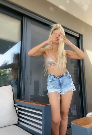 6. Sexy Demet Telli Shows Cleavage in Silver Bikini Top