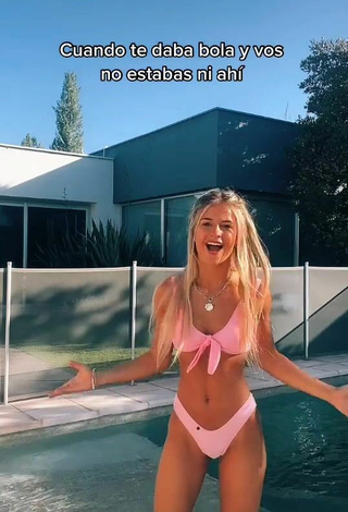 Emiestoco Shows Cleavage in Seductive Pink Bikini at the Swimming Pool