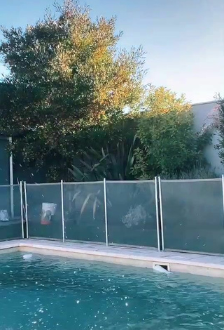 Really Cute Emiestoco Shows Cleavage in Bikini at the Pool