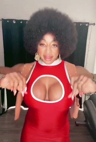 2. Hot Monique Jones Shows Cleavage in Dress