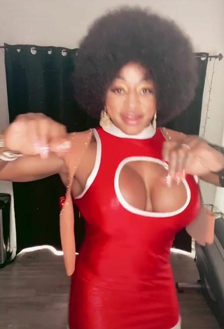 3. Hot Monique Jones Shows Cleavage in Dress