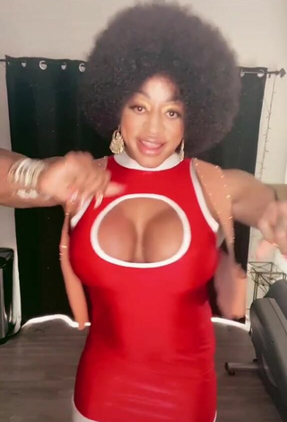 4. Hot Monique Jones Shows Cleavage in Dress