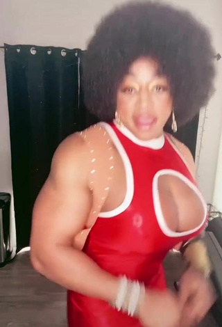 6. Hot Monique Jones Shows Cleavage in Dress
