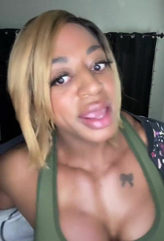 6. Cute Monique Jones Shows Cleavage in Green Crop Top