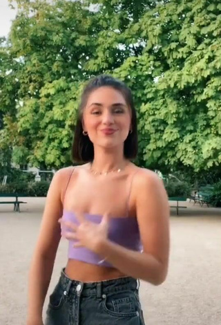 Beautiful Fleur Shows Cleavage in Sexy Purple Crop Top
