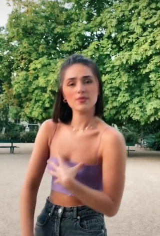 2. Beautiful Fleur Shows Cleavage in Sexy Purple Crop Top