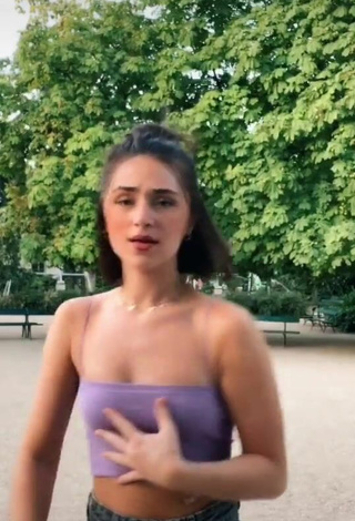 3. Beautiful Fleur Shows Cleavage in Sexy Purple Crop Top