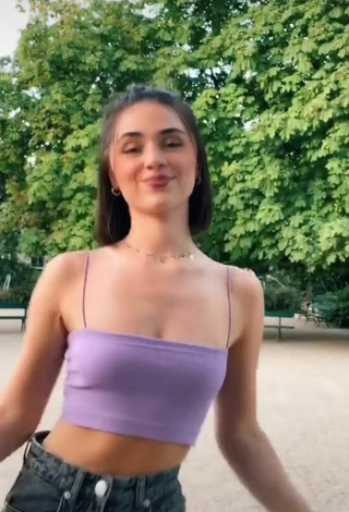 5. Beautiful Fleur Shows Cleavage in Sexy Purple Crop Top