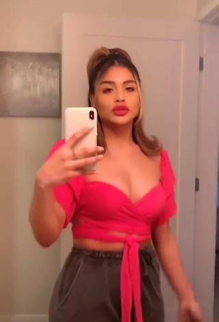 Dazzling Gabriela Bandy Shows Cleavage in Inviting Pink Crop Top