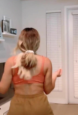 4. Wonderful Gabriela Bandy Shows Cleavage in Orange Crop Top and Bouncing Breasts