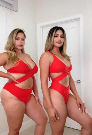Alluring Gabriela Bandy Shows Cleavage in Erotic Red Bikini