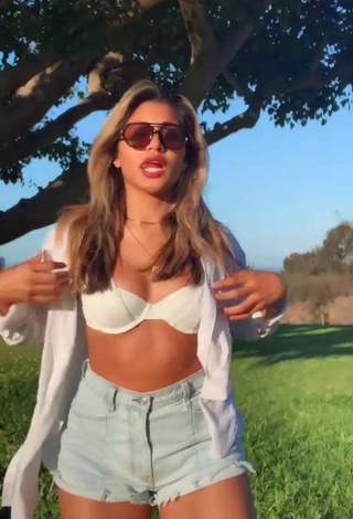 Sexy Gabriela Bandy Shows Cleavage in White Bra