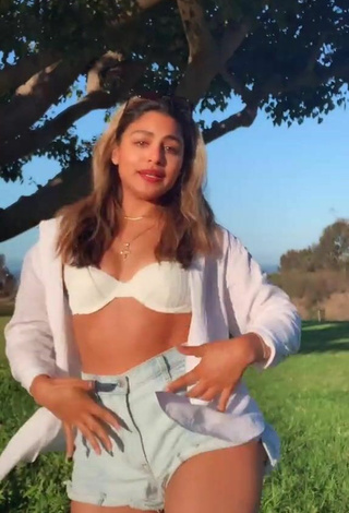 6. Sexy Gabriela Bandy Shows Cleavage in White Bra