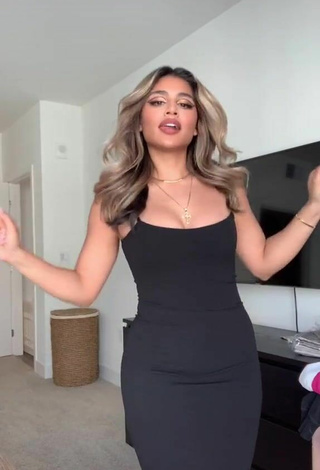 2. Sexy Gabriela Bandy Shows Cleavage in Black Dress