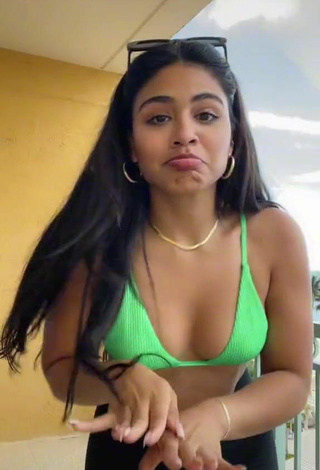 2. Sexy Gabriela Bandy Shows Cleavage in Green Bikini Top