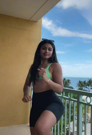 4. Sexy Gabriela Bandy Shows Cleavage in Green Bikini Top