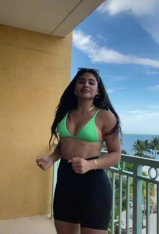 6. Sexy Gabriela Bandy Shows Cleavage in Green Bikini Top