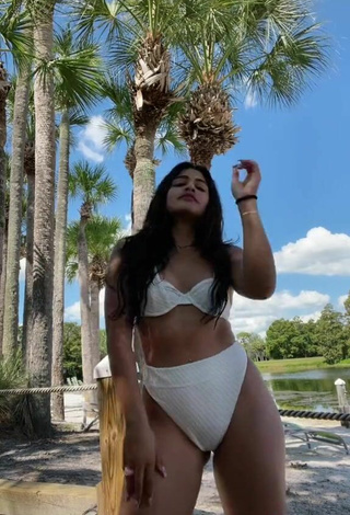 3. Cute Gabriela Bandy Shows Cleavage in White Bikini