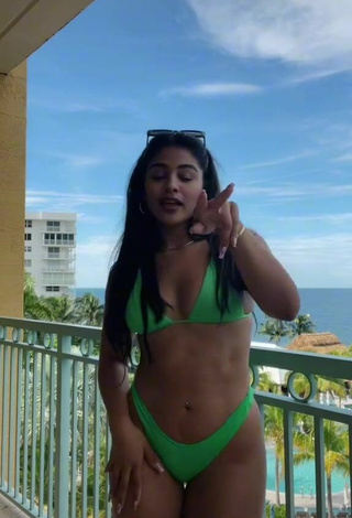 4. Sexy Gabriela Bandy Shows Cleavage in Green Bikini