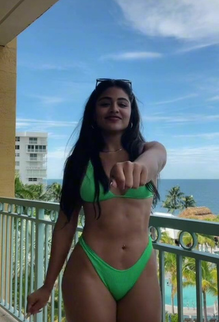 6. Sexy Gabriela Bandy Shows Cleavage in Green Bikini