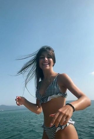 6. Sexy Giuls Shows Cleavage in Checkered Bikini in the Sea