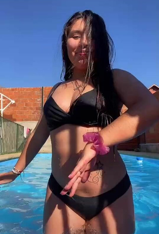 2. Cute Christel Quiroz Shows Cleavage in Black Bikini at the Pool