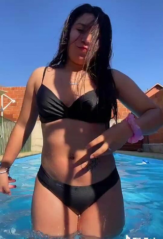 6. Cute Christel Quiroz Shows Cleavage in Black Bikini at the Pool