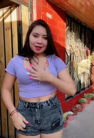 4. Cute Christel Quiroz Shows Cleavage in Purple Crop Top