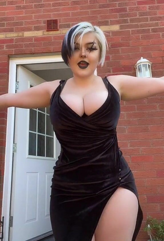 5. Hot Hollymarie Shows Cleavage in Black Dress