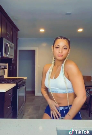 3. Sweetie DaniLeigh Shows Cleavage in White Crop Top