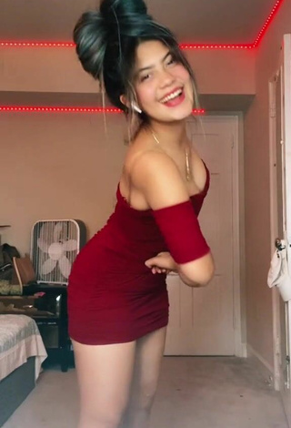1. Hot Cristel Mejia Shows Cleavage in Red Dress