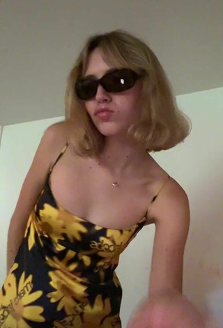 5. Sexy Claire Drake Shows Cleavage in Floral Dress