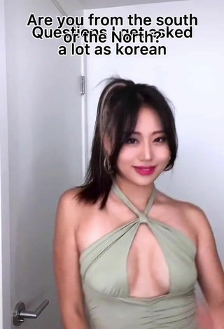 2. Sexy Jooshica Shows Cleavage in Green Dress