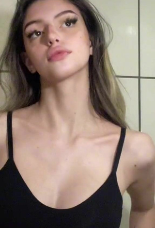 Sexy Julia Turati Shows Cleavage in Black Crop Top