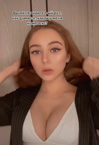 6. Sexy kor.liz Shows Cleavage in White Crop Top