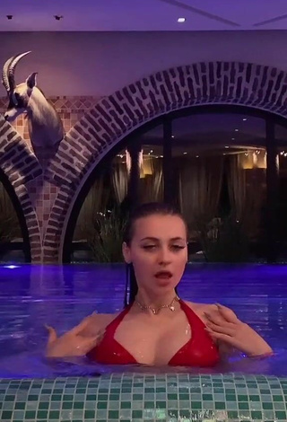 1. Sexy Irina Lazutchikova Shows Cleavage in Red Bikini at the Pool