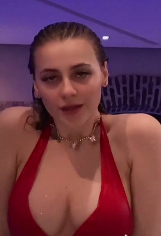 6. Sexy Irina Lazutchikova Shows Cleavage in Red Bikini at the Pool