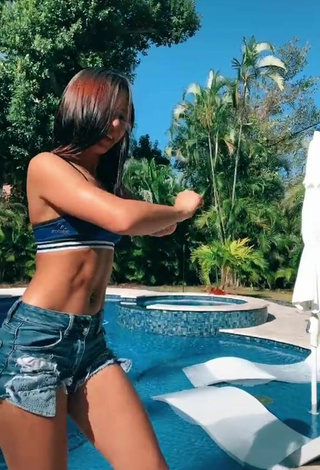 6. Cute Lianny Milan Shows Cleavage in Blue Crop Top at the Swimming Pool