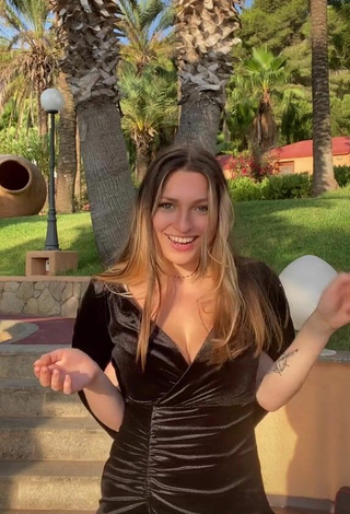 2. Sexy Lucy Lacht Shows Cleavage in Black Dress