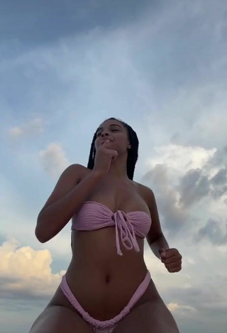 1. Amazing Lynn Bailey Shows Cleavage in Hot Pink Bikini at the Beach