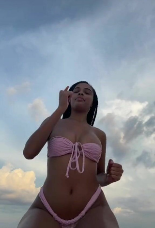 5. Amazing Lynn Bailey Shows Cleavage in Hot Pink Bikini at the Beach