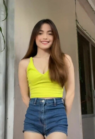 Hottie Madelaine Red Shows Cleavage in Yellow Crop Top