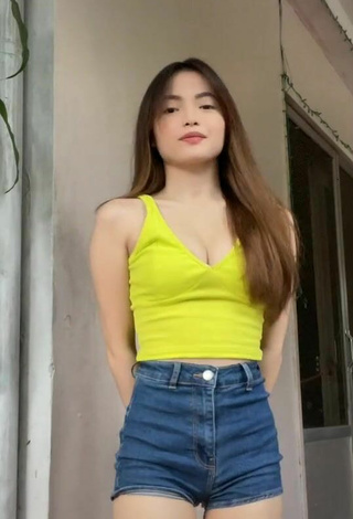 2. Hottie Madelaine Red Shows Cleavage in Yellow Crop Top