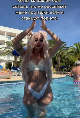 Cute Makeeva Shows Cleavage in White Bikini at the Swimming Pool