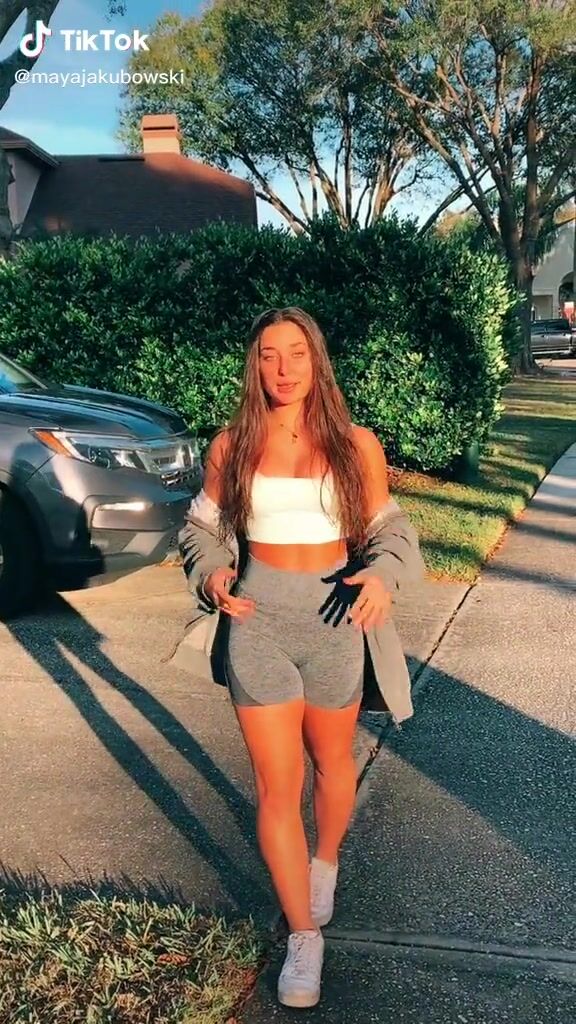 Beautiful Maya Jakubowski Shows Cleavage in Sexy White Crop Top