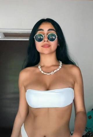 1. Sexy Marianella Flórez Lovera Shows Cleavage in White Bikini and Bouncing Boobs