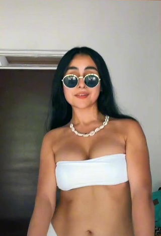 3. Sexy Marianella Flórez Lovera Shows Cleavage in White Bikini and Bouncing Boobs
